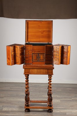 Lot 1683 - A FLEMISH WALNUT CABINET ON STAND