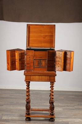 Lot 1683 - A FLEMISH WALNUT CABINET ON STAND