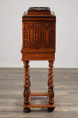 Lot 1683 - A FLEMISH WALNUT CABINET ON STAND