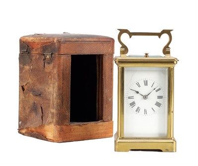 Lot 1230 - A BRASS CARRIAGE CLOCK WITH TRAVEL CASE